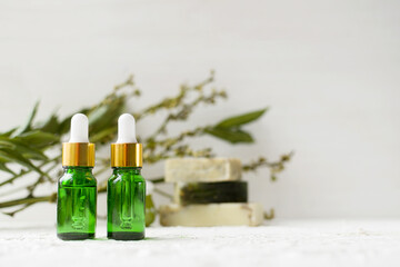 Eco cosmetic products for skin care. Glass cosmetic bottles and soap with natural essential oil, vitamin and prebiotic serum for health.