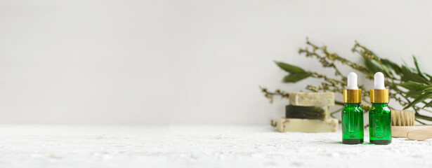 Eco cosmetic products for skin care. Glass cosmetic bottles and soap with natural essential oil, vitamin and prebiotic serum for health.