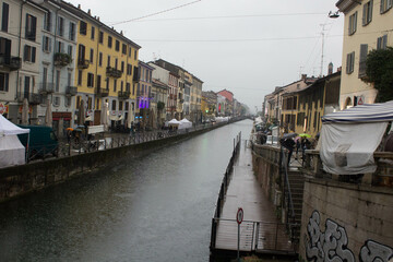 Milan, Naviglio Grande, evocative image of the Naviglio Grande in bad weather 

