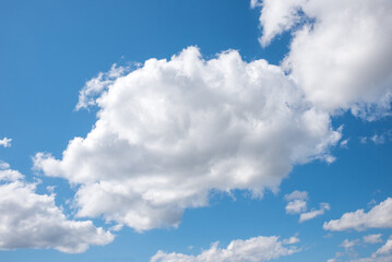 Naklejka na ściany i meble big cumulus cloud heap and blue sky