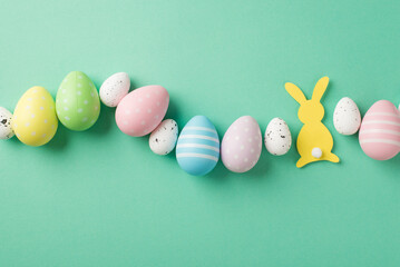 Top view photo of easter decorations row of multicolored easter eggs and easter bunny silhouette on...