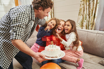 Happy family spending time together at home