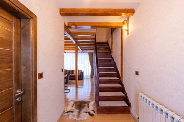 Wooden stairs in mountain house interior