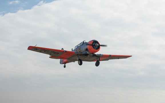 TOCNA, CZECH REPUBLIC - 3th MARCH 2022. The historic AT-16 Harward II attack aircraft flies low through the runway at Tocna Airport near Prague.