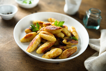 Traditional German potato dumplings with parsley
