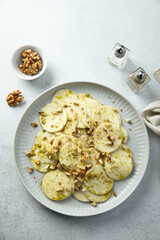 Courgette carpaccio with walnut and olive oil
