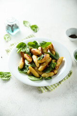 Potato dumplings with fresh spinach