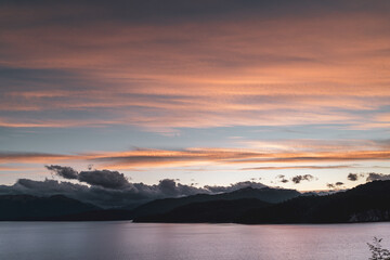 orange clouds over the lake