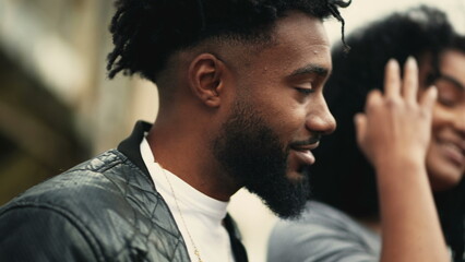 A handsome black man face smiling at camera