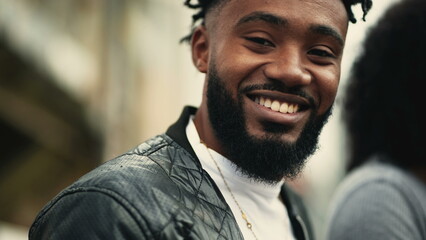 A handsome black man face smiling at camera