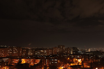 Night view photo of the city and its nightlife lights, from the window.