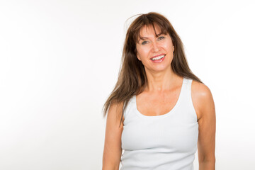 portrait senior woman posing smiling looking at camera on white background