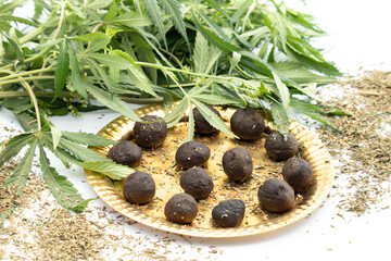 Bhaang Ki Goli Or Bhang Ka Gola Is Made Of Is Herbal Edible Balls Made Of Cannabis Leaves Paste And Is Consumed Specially On Indian Festival Holi For Fun. Isolated On White Background With Copy Space