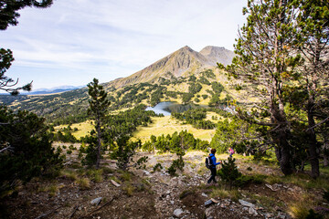Obraz premium Young hiker girl enjoying in Camporrells, Pyrenees, France