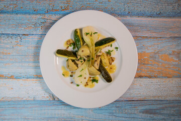 Recipe Greek style vegetables, artichoke, mushroom, zucchini, small onions. High quality photo