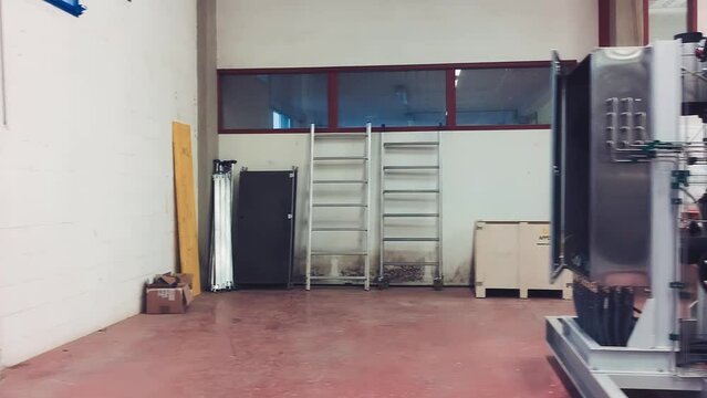 Slow motion view of pipelines in a water purification plant, industrial concept.