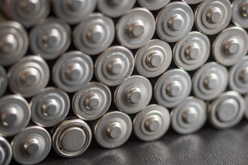 AA batteries background closeup view