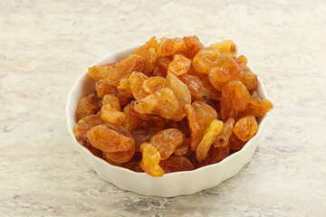 Sweet yellow raisin in the bowl