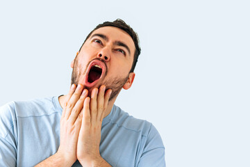 screaming bearded brutal man, shocked aggressive young annoyed bearded man bad mood isolated on...