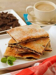 Coca filled with chocolate. Typical food from Catalonia, Spain.