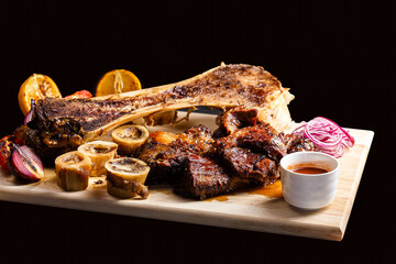 on a kitchen wooden cutting board, fried on a fire, thigh bone with marrow, shish kebab meat, bowl...