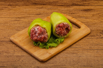 Raw stuffed bell pepper with meat
