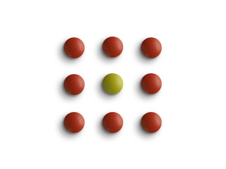 Square made from set of red an yellow pills isolated on white background. Concept of healthcare and medicine.