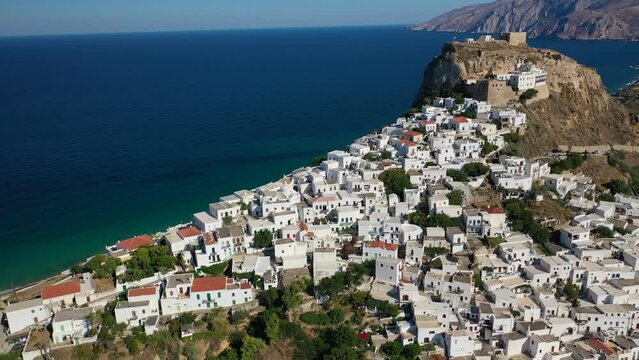 Aerial drone video of breathtaking and picturesque main village of Skyros island featuring uphill medieval castle with scenic views to Aegean sea, Sporades islands, Greece