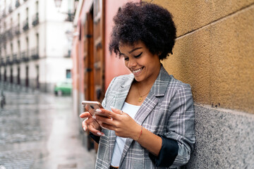 Pretty Afro Woman Using Phone