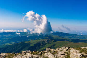 Mountain landscape with blue sky and clouds