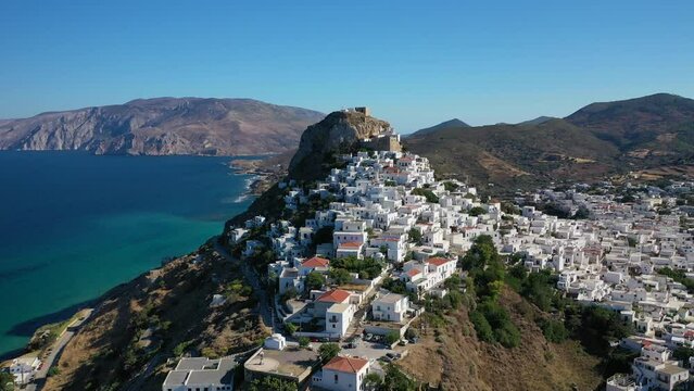 Aerial drone video of breathtaking and picturesque main village of Skyros island featuring uphill medieval castle with scenic views to Aegean sea, Sporades islands, Greece
