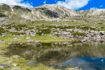 Lake in the mountains (Peak of Bastiments, Pyrenees Mountains)