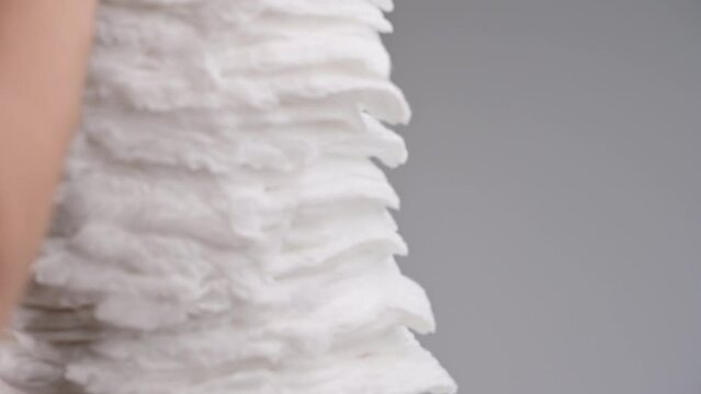 Pile of baby diaper panties diaper isolated on background, close-up, copy space, infant