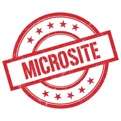 MICROSITE text written on red vintage round stamp.