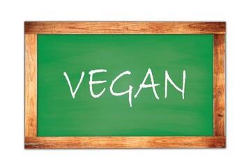 Obraz premium VEGAN text written on green school board.