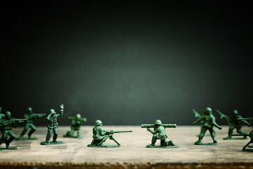 image of toy soldiers over wooden table