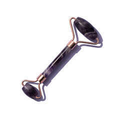 Facial massage amethyst gua sha roller isolated on white. Face roller, massager made from natural...