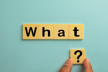 Wh-Question,Problems,Solution,confusion concept.,What word and question mark on wooden cube over blue sky background.