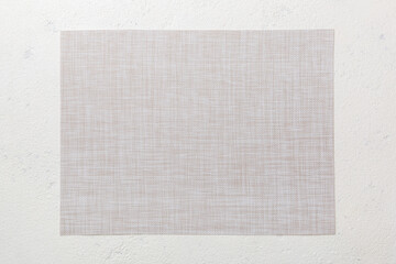 Fototapeta premium Top view of grey tablecloth for food on cement background. Empty space for your design