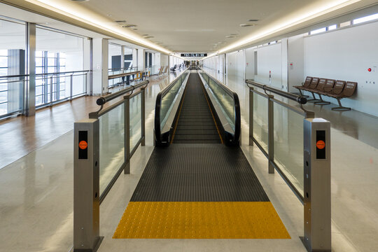 Empty Moving Sidewalk In Vacant Airport Terminal 