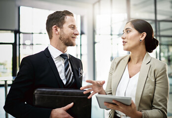 His constructive criticism is always helpful. Cropped shot of two businesspeople looking at a...