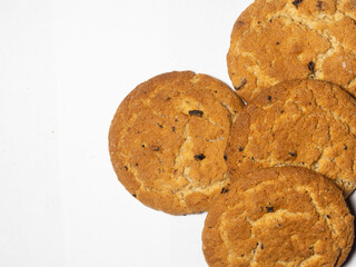 Oatmeal raisin cookies on a white background. Sweets.  tea biscuits. Treats to the table