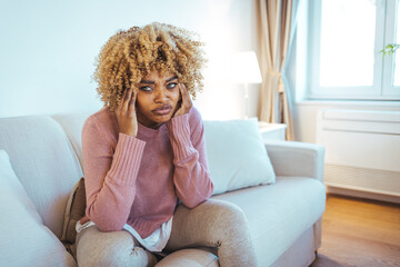 Young hopeless woman suffering from depression having nervous breakdown holding head on isolated...