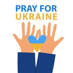  Hands with blue and yellow heart. Pray for Ukraine