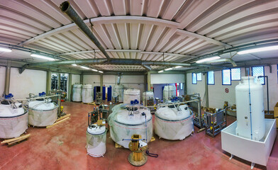 Panoramic view of pipelines in a water purification plant, industrial concept.