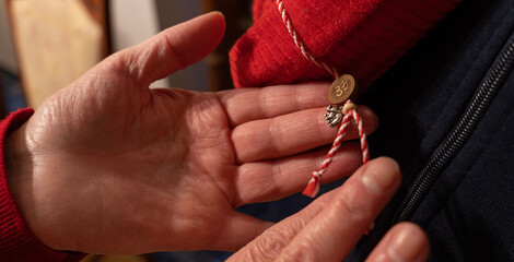 hands of a person with rosary