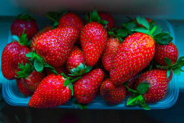 Red ripe strawberries background.