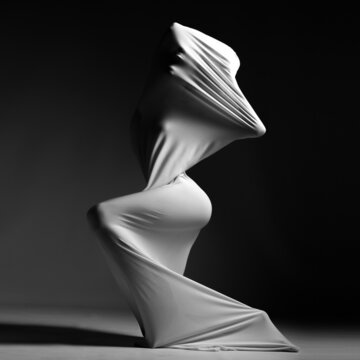 Fototapeta abstract image of a girl wrapped in a white cloth