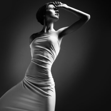 abstract image of a girl wrapped in a white cloth