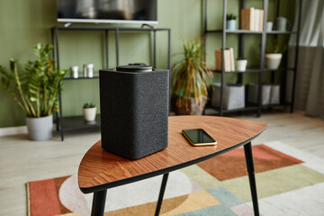 Background image of smart speaker with home AI system on wooden table in modern interior, copy space